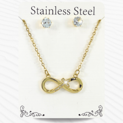 Juego de collar y aretes dorados con detalles de cristal en acero inoxidable forma de cruz y símbolo de infinito, El juego de collar y aretes de moda para mujer es un accesorio esencial que puede transformar cualquier atuendo. Este tipo de conjunto no solo añade un toque de elegancia y sofisticación, sino que también permite expresar el estilo personal de quien lo lleva.