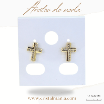 Aretes pequeños forma cruz 1.10 x 0.80 cm dorados con cristales. Los aretes son un accesorio esencial en el mundo de la moda femenina. No solo completan un atuendo, sino que también pueden expresar la personalidad y el estilo de quien los lleva. Aretes de moda para mujer que están causando sensación este año