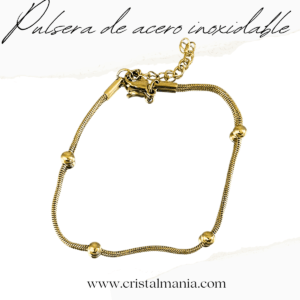 Pulsera dorada delgadita con adornos de bolas en acero inoxidable. Las pulseras  son un accesorio que combina elegancia y funcionalidad. Este diseño en particular, ofrece un estilo moderno y sofisticado que se adapta a cualquier ocasión.