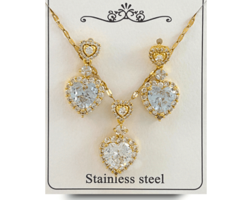 Collar y aretes de moda dorados para mujer en acero inoxidable con corazones, Descubre nuestros elegantes sets de collares y aretes de acero inoxidable, ¡la moda perfecta que complementa tu belleza! ✨  #cristalmania #ComplementaTuBrillo