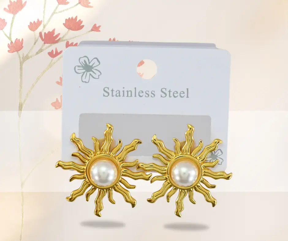 Aretes dorados en forma de sol en acero inoxidable
